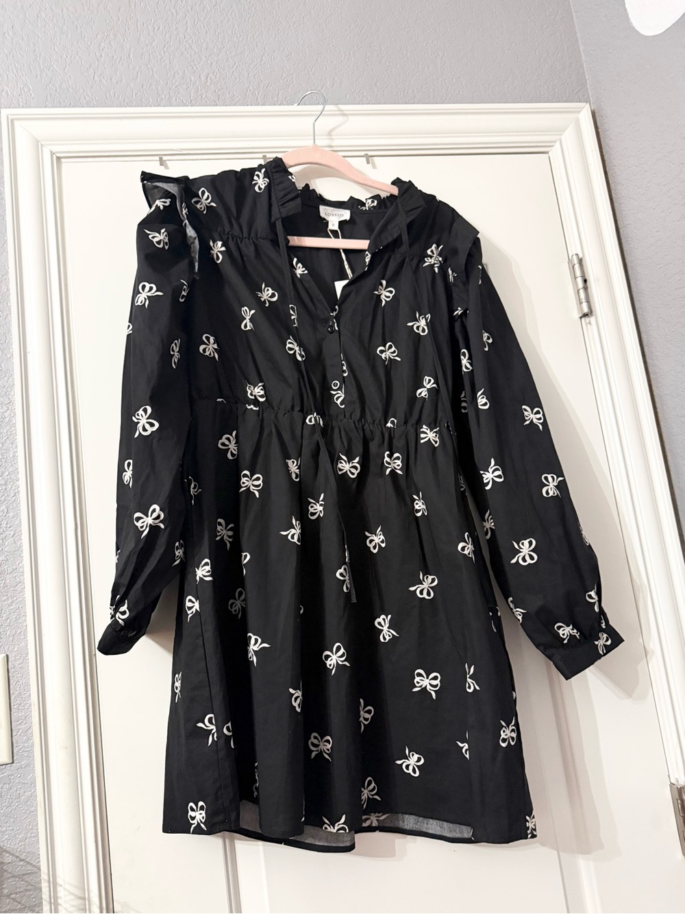 Black Long-Sleeve Mini Dress with White Bow Print